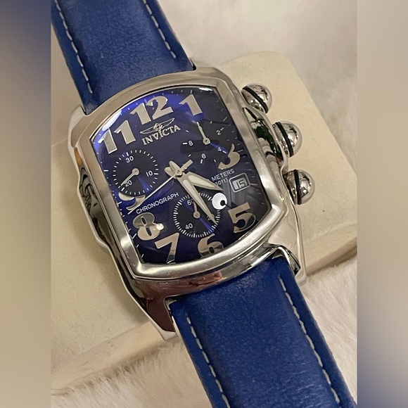 Invicta Blue and Silver Men's Watch model # 9815.GENTLY USEDWorn 1 or 2 times.
